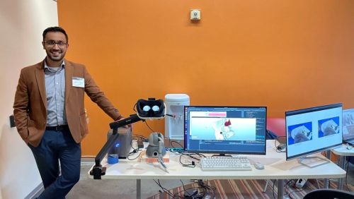 Adnan Munawar conducting a system demo during the 2023 Robotics Industry Day